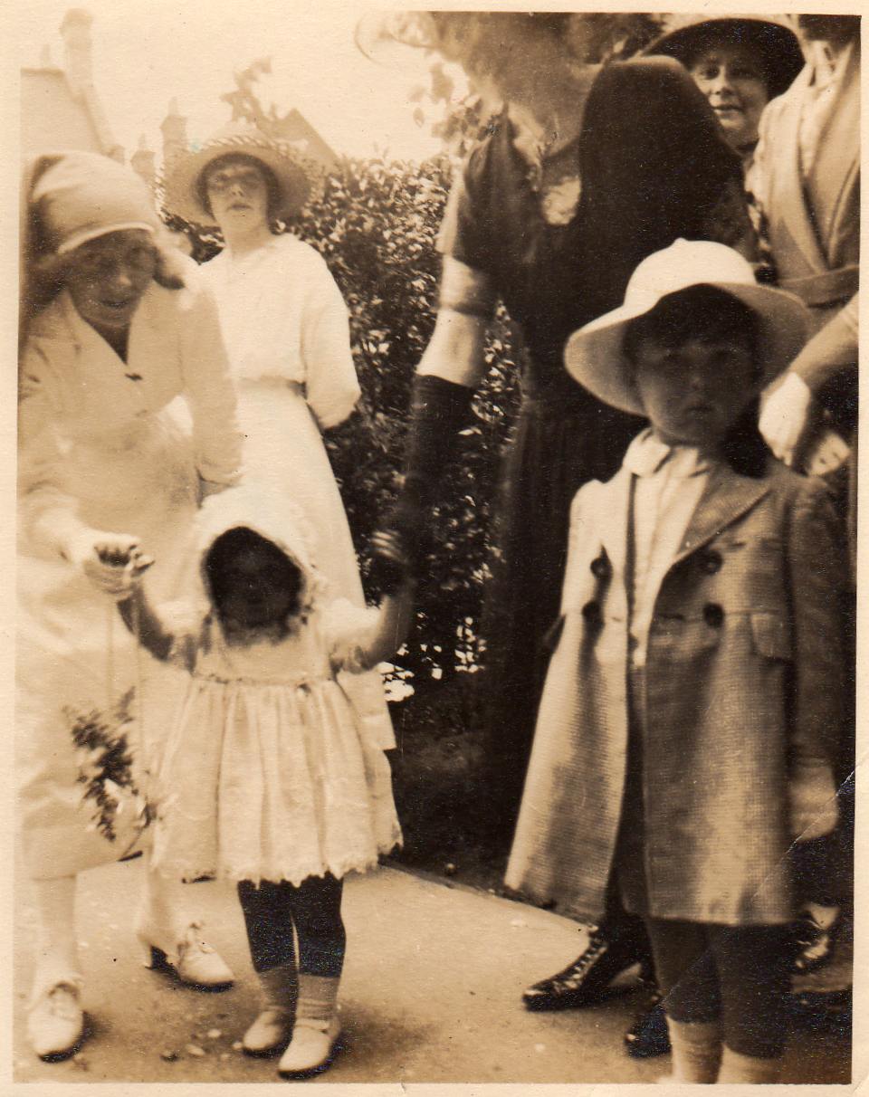 A child with nanny at wedding 1921.jpg