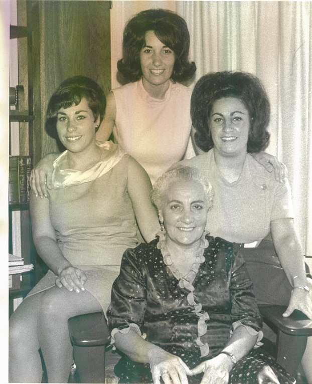 John's adopted daughters from Greece Tia, Nina, one more, and their mother.